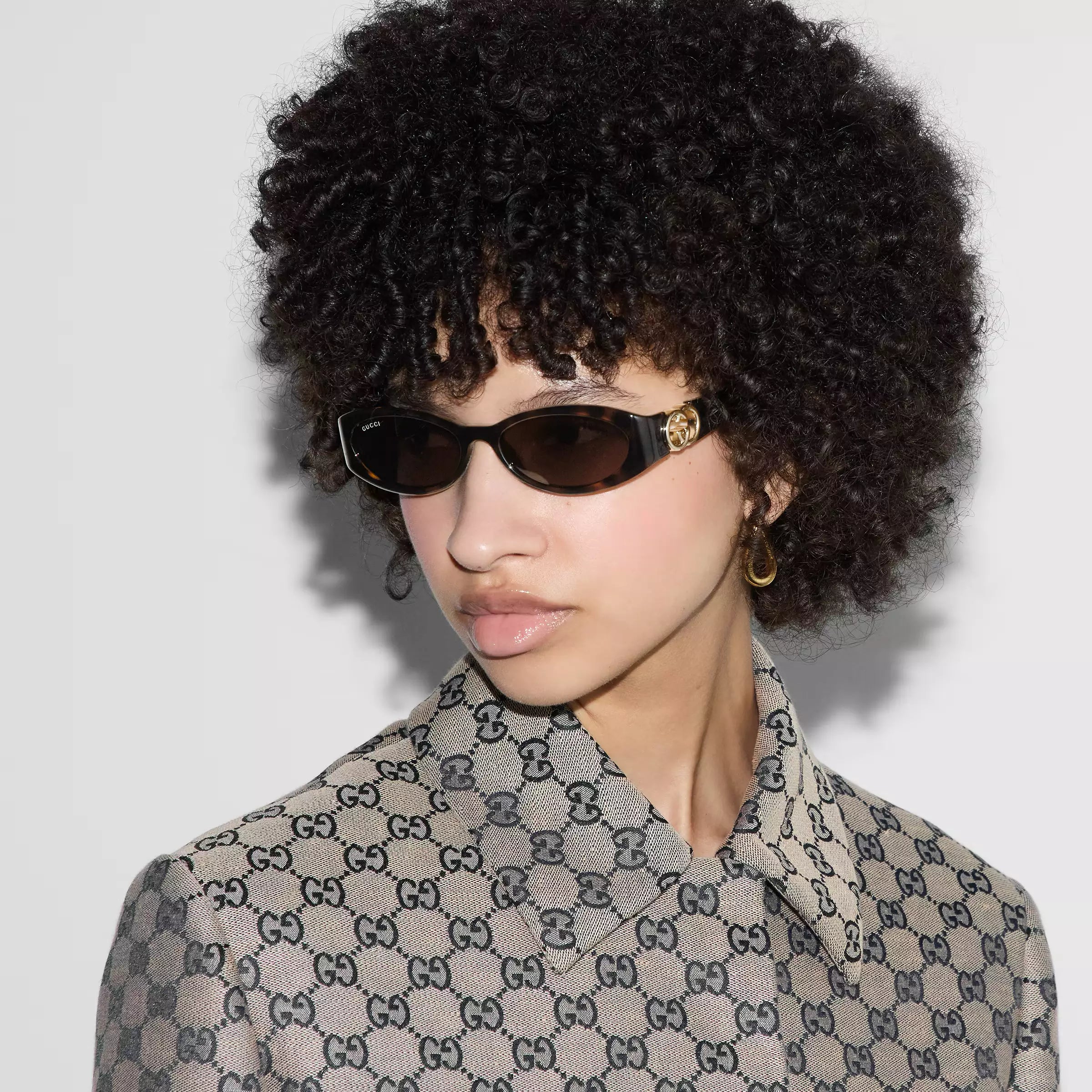 Occhiali da sole Gucci con montatura ovalata - Variazione tartaruga